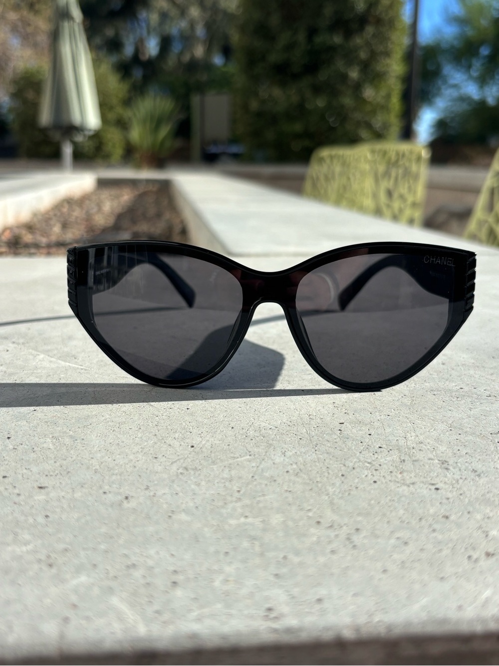 CHANEL Black Sunglasses with Gold CC Emblem - Picture 3 of 3